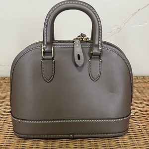 Coach Revel in Dark Stons